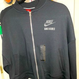 Never worn Nike AIR jacket size L.